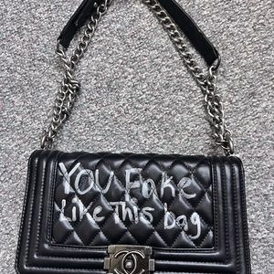 Black purse with chain